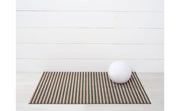 Breton Stripe Shag Mat - Malibu, a durable, tufted floor mat inspired by timeless French navy stripes, displayed on a striped rug. Ideal for versatile indoor or outdoor use.