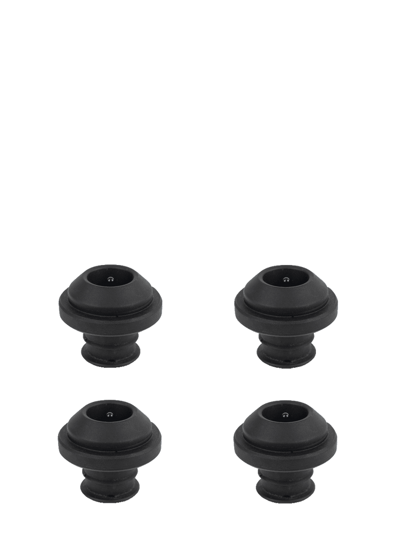 Set of four Peugeot Preserve Still Wine Stoppers, featuring sleek black round designs, ideal for preserving wine freshness.