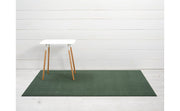 Chilewich Solid Shag Mats - Cactus - 24 x 36 displayed on a green rug, showcasing its modern design and durable texture, ideal for versatile indoor or outdoor use.