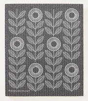 Three Bluebirds Swedish Dishcloths - White Sunflowers on Graphite features a grey and white floral pattern, ideal for eco-friendly cleaning in any kitchen.