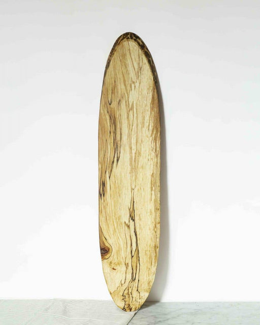 Petermans Boards and Bowls Inc. - SPALTED MAPLE BAGUETTE BOARD (26 X 6), showcasing an elongated oval shape with rough, soy stained edges, perfect for bread and charcuterie.