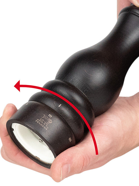 Peugeot | Paris u'Select Wood Salt Mill, Chocolate, with lion logo on top, showcasing twist action and grind control system for precise seasoning.