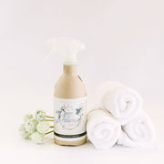 Root & Splendor | Foaming Stain Remover - Fiber close-up, featuring eco-friendly, non-toxic packaging with a label highlighting its powerful stain-removing capabilities for various household stains.