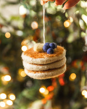 Farmhouse Pottery - Felted Breakfast Ornament: Pancake Stack, featuring three felt pancakes with butter and blueberries, handcrafted in Nepal, perfect for festive kitchen decor.