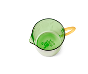 Great Jones | Beyond Measure 4-Cup - Broccoli-Butternut glass measuring cup, with clear measurements, designed for prep, serving, and entertaining; ideal kitchenware from Athens Cooks.