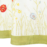 Springfields Multi French Tablecloth featuring poppies and wildflowers, handprinted for a touch of Provençal charm, perfect for enhancing any dining space.