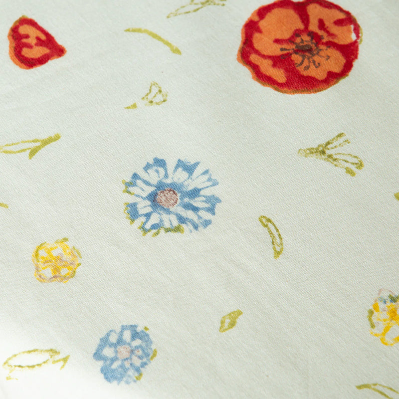 Caravan Home | 59 x 86 Springfields Multi French Tablecloth featuring handprinted poppies and wildflowers, perfect for adding a touch of Provençal charm to any dining space.
