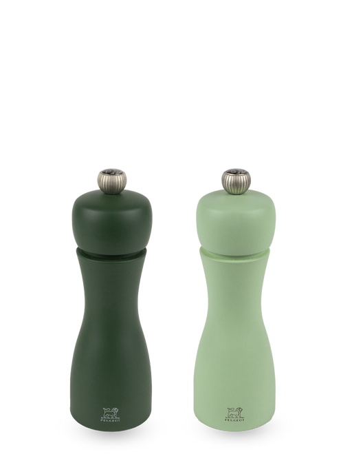 Peugeot | Tahiti Duo Salt + Pepper Mills, Water: Elegant tabletop mills showcasing a refined hourglass design, featuring adjustable grind settings and sustainably sourced wood.