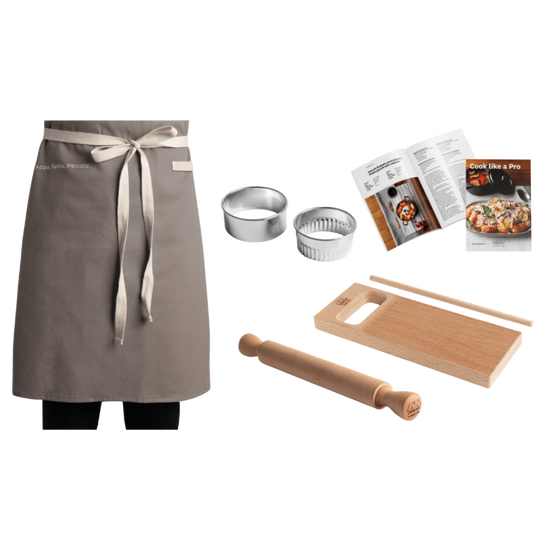 Marcato | Gnocchi Like A Pro Kit includes apron, cutters, rolling pin, cutting board, measuring stick, and recipe booklet, perfect for homemade gnocchi preparation.