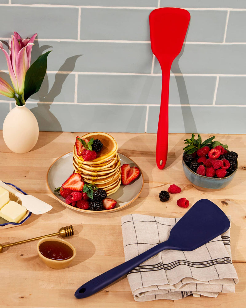 GIR Ultimate Turner: Slate lifting pancakes beside bowl of berries, showcasing its ability to handle hefty foods.