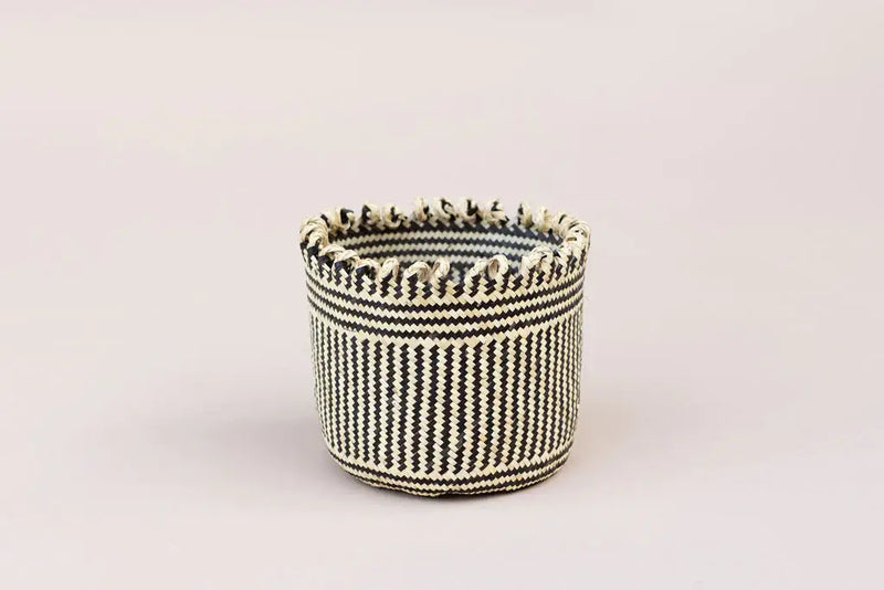 NEEPA HUT - Handmade Eco Storage Basket: Beige, intricately woven by Bidayuh artisans, ideal for organizing stationery or holding houseplants, showcasing traditional craftsmanship.
