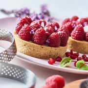 de Buyer | Perforated Tart Ring - 4, made of 18/10 stainless steel, features perforations for even baking and crisp tart crusts, ideal for home baking enthusiasts.