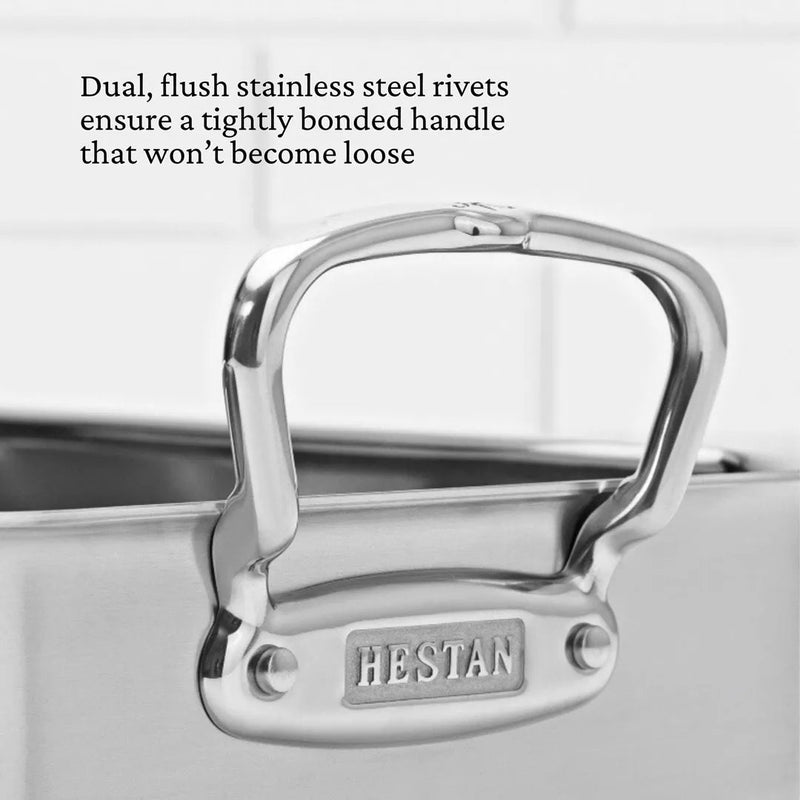 Hestan Provisions | Classic Roaster with Rack, 14.5 Inches: Close-up of a stainless-steel handle with flush rivets, ensuring durability and easy handling for kitchen use.