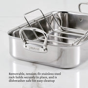 Hestan | Polished Clad Stainless Steel Roaster with Rack, Small, featuring a tension-fit rack and ergonomic handles, ideal for versatile cooking and easy cleanup.