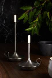 VANMOKUM | GRAYPANTS Wick Portable Rechargeable Lamps - Black, featuring a sleek design with plated aluminum and acrylic, ideal for creating ambiance and togetherness in various settings.
