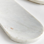Napa Home & Garden - Amal Marble Trays, featuring an elegant close-up of sleek white marble with subtle brown spots, ideal for serving cheese and snacks.