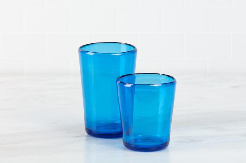 Fortessa Veranda HiBall 19oz Sky Blue Tumblers, set of two, displayed on marble surface, ideal for stylish drink presentation.