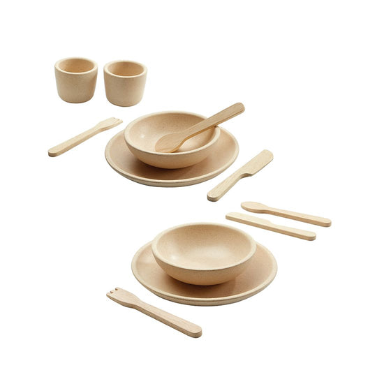 PlanToys Kids Pretend Playtime Tableware Toy Set featuring wooden dishes and utensils, including bowls, spoons, and cups, ideal for imaginative play.