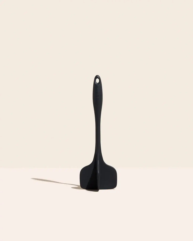GIR Mini Quad Chopper: Black, a versatile black silicone-tipped spatula with ergonomic handle, ideal for mixing, mashing, and chopping in various kitchen tasks.