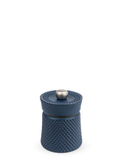 Peugeot | Bali Cast Iron Pepper Mill, Dark Blue: A compact, hobnail-textured cast-iron vessel with a silver knob, designed to enhance your pepper seasoning experience.