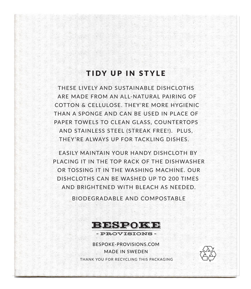 Bespoke Provisions - Lemons Swedish Dishcloth with printed care instructions, packaged in a clear protective sleeve. Eco-friendly, biodegradable cleaning cloth showcased on paper.