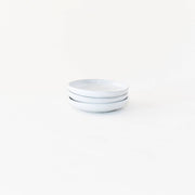 Sarah Kersten - Olive Dish: Basin Collection: Black, a small, elegant white dish from Athens Cooks, perfect for serving olives or bread.