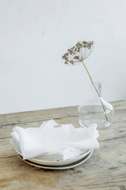 MagicLinen - Set of 2 linen napkins, elegantly displayed on a table with a flower vase, showcasing their versatility and table decor appeal.