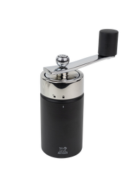 Peugeot | Isen Nutmeg Mill, Matte Black: A sleek, hand-crank grinder with an adjustable setting, ideal for finely grinding nutmeg, featuring a secure, lifetime-guaranteed mechanism.