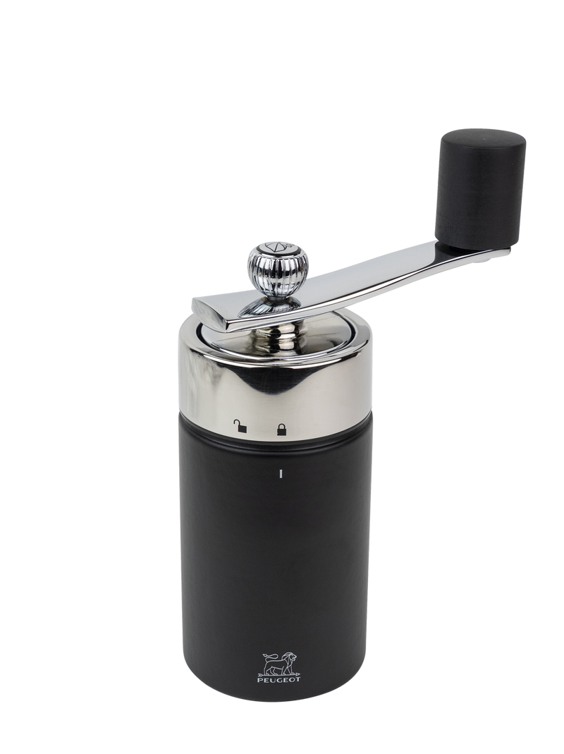 Peugeot | Isen Nutmeg Mill, Matte Black: A sleek, hand-crank grinder with an adjustable setting, ideal for finely grinding nutmeg, featuring a secure, lifetime-guaranteed mechanism.