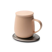 OHOM - Ui 3 Self-heating Mug Set: Jasmine White on a warming coaster, designed for maintaining beverage temperature and wirelessly charging devices.