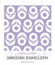 Bespoke Provisions - Flowers on Lavender Swedish Dishcloth featuring a purple and white floral pattern, ideal for cleaning and eco-friendly kitchen use.