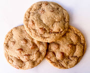Southern Roots Sisters - Salted Caramel Cookie Mix: Three golden-brown cookies with caramel chips and sea salt, showcasing sweet-savory perfection for Athens Cooks' curated kitchen delights.