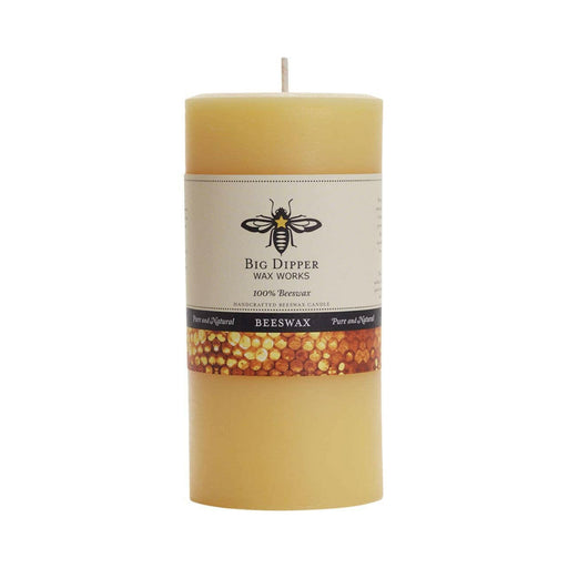 Close-up of a large ivory Pure Beeswax Pillar Candle by Big Dipper Wax Works, showcasing a cylindrical design and label, perfect for elegant home illumination.