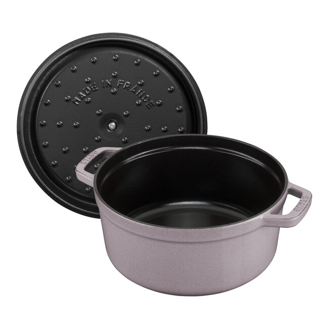 Staub 5.5 qt Round Cocotte in Lilac, featuring a Chistera lid with self-basting spikes and loop handles, ideal for versatile cooking.