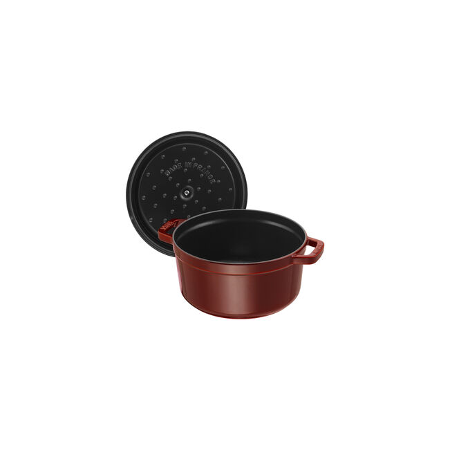 Staub | Round Cocottes - 5.5 qt Grenadine, red enameled cast-iron Dutch oven with Chistera lid, ideal for slow cooking, handcrafted in France.