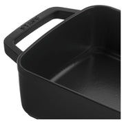 Staub | Cast-Iron Rectangular Roasting Pan 10 x 15, features a durable black matte enamel interior, ideal for browning and roasting, suitable for various heat sources.