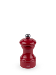 Peugeot | Bistro Pepper Mill, Passion Red: A glossy, hourglass-shaped manual grinder with adjustable coarseness, reflecting classic design from 1874, sold by Athens Cooks.