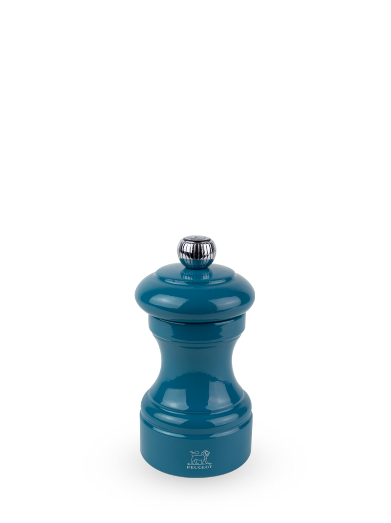 Peugeot | Bistro Pepper Mill, Pacific Blue: A compact, glossy blue beech wood grinder with adjustable metal knob, ideal for enhancing gourmet dishes.
