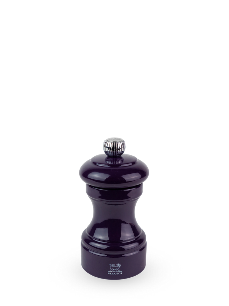 Peugeot | Bistro Salt Mill, Eggplant: An hourglass-shaped wooden mill with a steel mechanism and metal knob, featuring the Peugeot lion logo near the base.