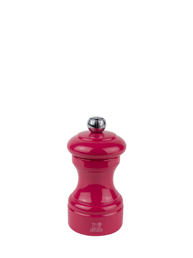 Peugeot | Bistro Pepper Mill, Candy Pink, features a classic hand-held design with a metal adjustment knob, offering precise grinding with lifetime-guaranteed mechanism.