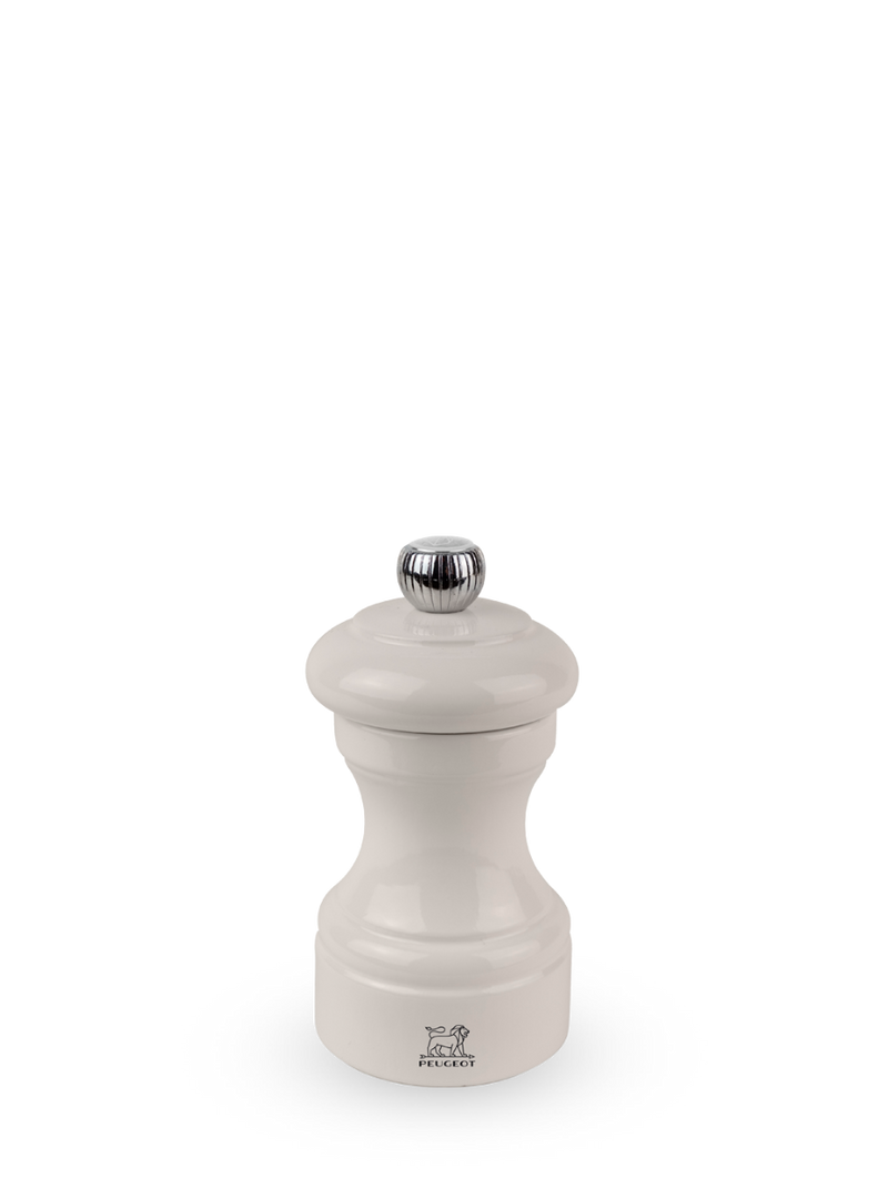 Peugeot | Bistro Salt Mill, Ivory: A classic beech wood spice grinder with a white lacquered body and fluted metal knob, showcasing the Peugeot lion logo near the base.