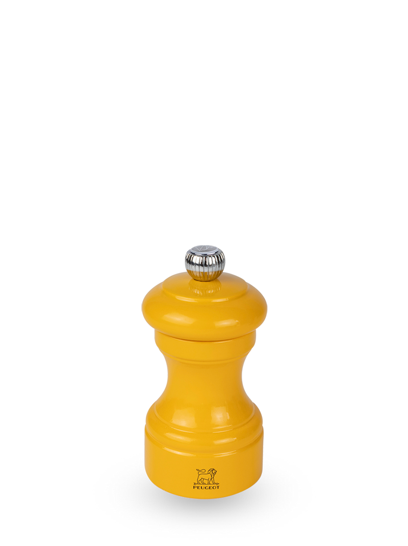 Peugeot | Bistro Salt Mill, Saffron: Glossy yellow tabletop pepper mill, crafted in France from sustainable wood, part of the Bistrorama collection at Athens Cooks.