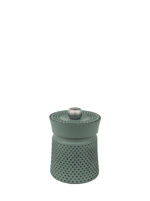 Peugeot Bali Cast Iron Pepper Mill, 3 Inches - Red, featuring a textured grip and adjustable grind, perfect for enhancing dishes with aromatic Sichuan pepper.