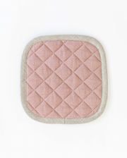 MagicLinen - Linen pot-holder with white border, quilted detailing, and hanging loop, ideal for heat protection in kitchens.
