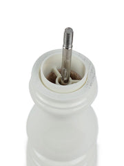 Inside view of Peugeot | Paris u'Select Ivory Lacquered Salt Mill, showing the central metal shaft and ceramic burr for precise salt grinding.