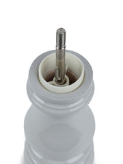 Interior view of Peugeot | Paris U'Select Salt Mill, Pearl Grey, showcasing its central threaded shaft and grinding-burr housing, designed for precise salt texture control.