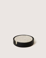 Graf Lantz - Kobon Leather Round Tray in black, designed for organizing jewelry or office essentials, crafted from sculpted Vachetta leather.
