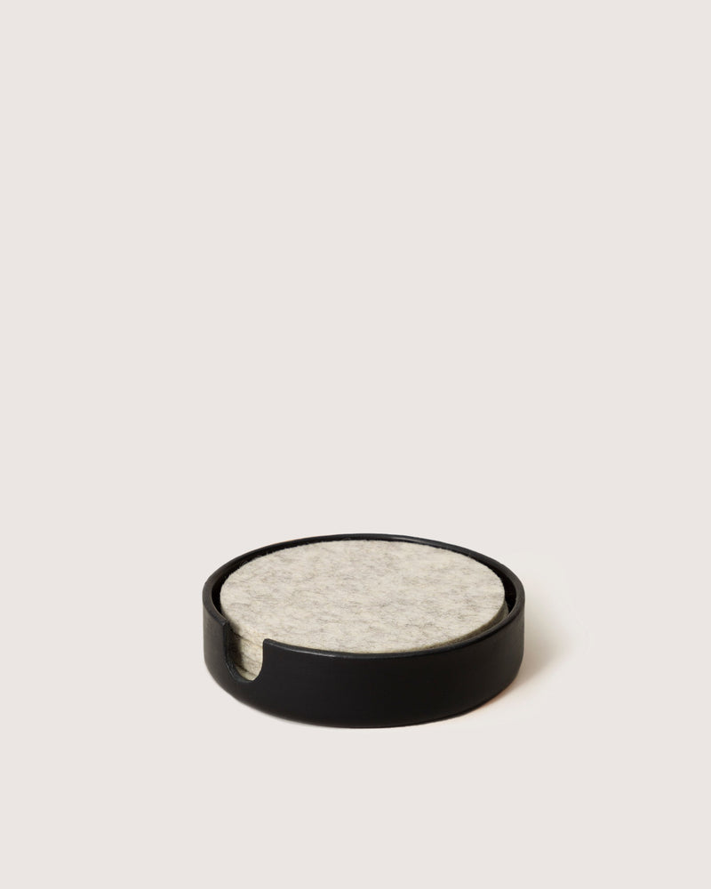 Graf Lantz - Kobon Leather Round Tray in black, designed for organizing jewelry or office essentials, crafted from sculpted Vachetta leather.