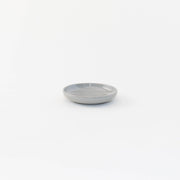 Sarah Kersten - Olive Dish: Basin Collection: Fig; a small, round, elegant dish ideal for appetizers or sides, showcasing versatility in kitchenware from Athens Cooks.