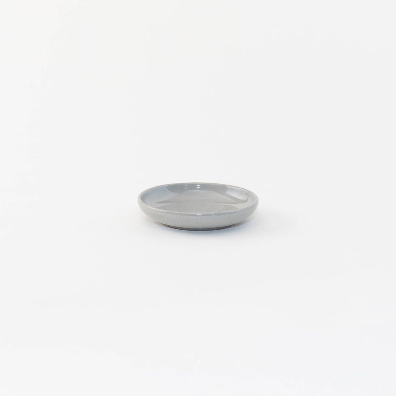 Sarah Kersten - Olive Dish: Basin Collection: Winter Mesa, a small, elegant dish ideal for appetizers, shown in a white bowl. Perfect for versatile kitchen use.